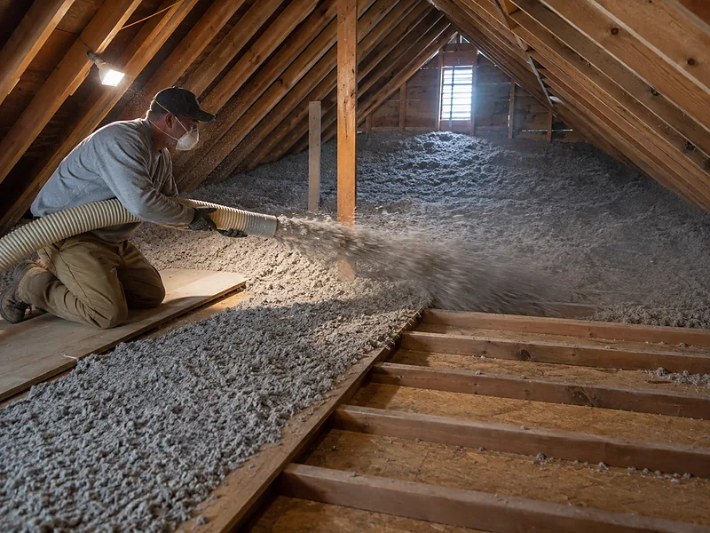 Blowing insulation across an attic floor